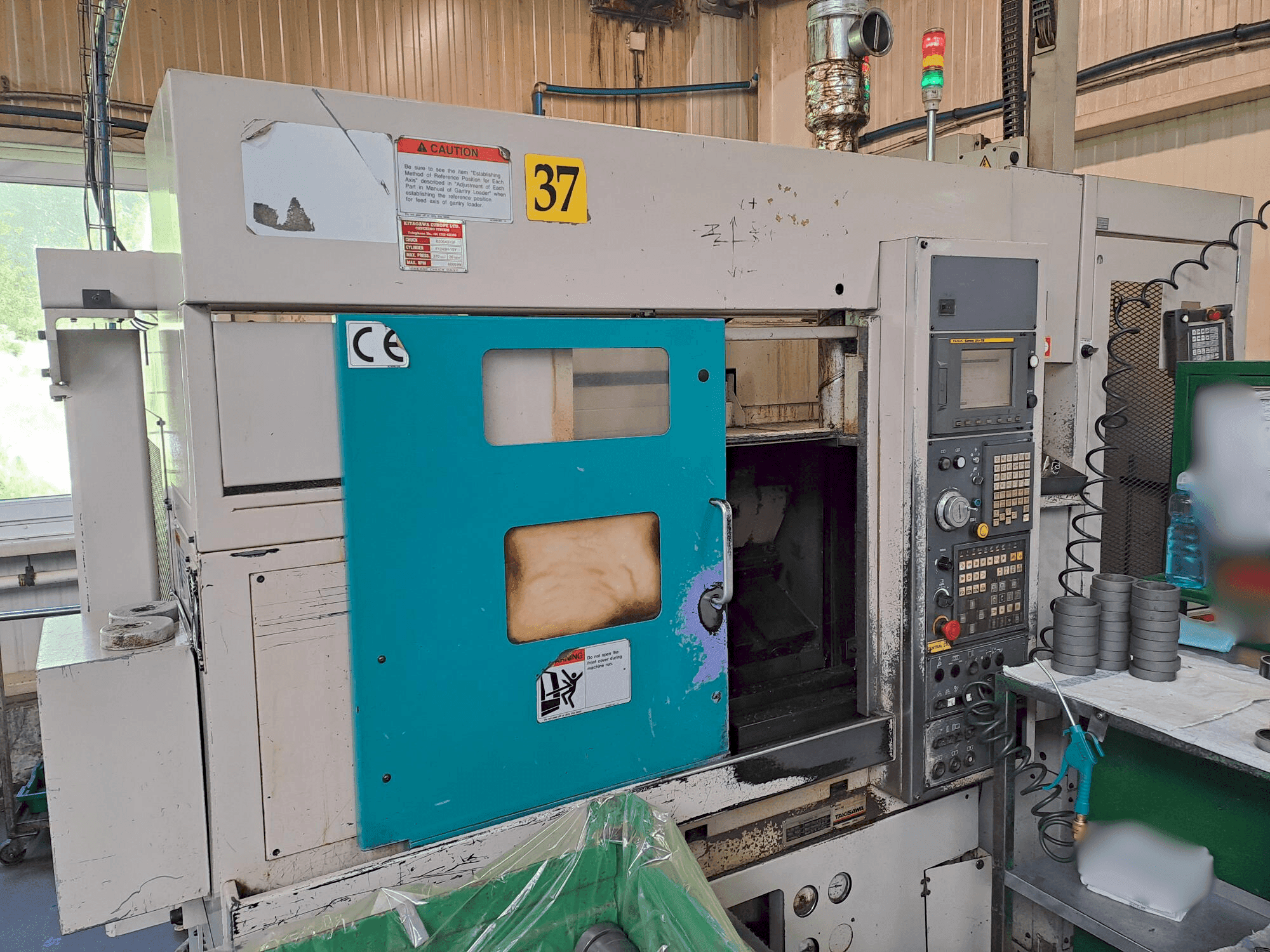 Frontansicht der Takisawa TC 200  Maschine