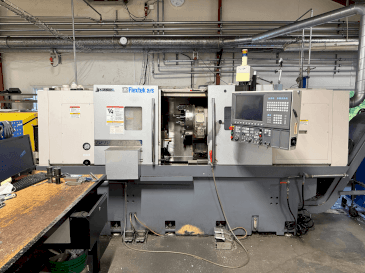Frontansicht der Okuma Genos L300E-M with FMB Turbo 8-80  Maschine